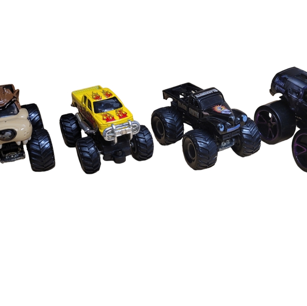 Lot of 4 Monster Jam Hot Wheels trucks 1:64 scale